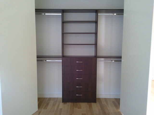 Custom Paint Grade Wainscoting and Crown Molding with a Swiss Coffee Lacquer Finish.