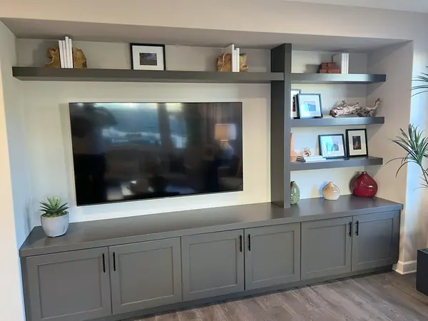 Charcoal media console with floating shelves, Camarillo