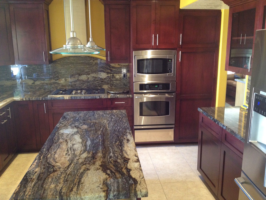 Frameless Alder Kitchen with Shaker Style doors with a Merlot Lacquer Finish