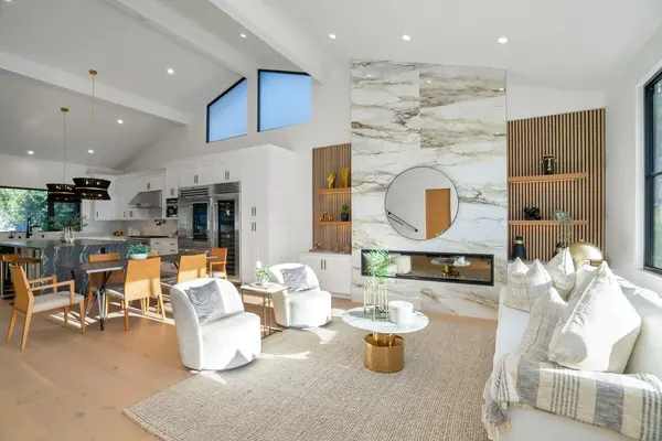 Open Great Room with Slatted Oak Display Shelves & Marble Fireplace