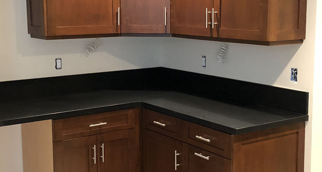 Traditional Paint Grade Entertainment Center with an Antique White Lacquer Finish