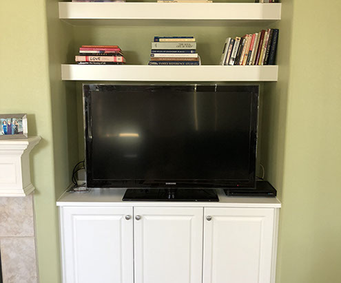 Traditional Paint Grade Entertainment Center with an Antique White Lacquer Finish