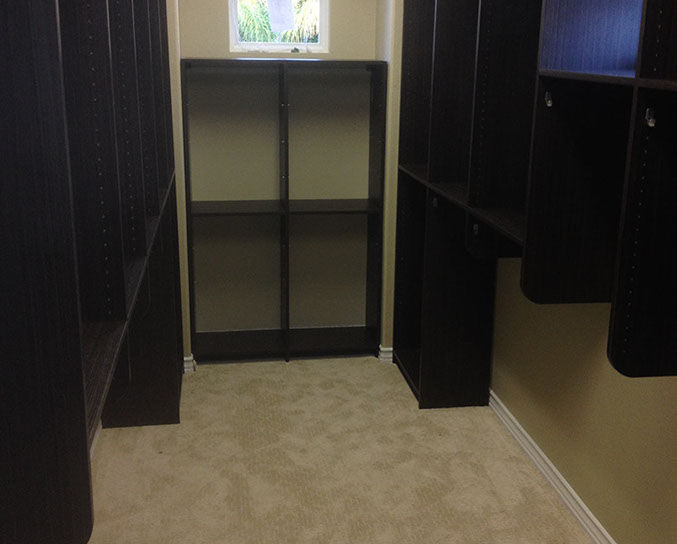 Custom Paint Grade Wainscoting and Crown Molding with a Swiss Coffee Lacquer Finish.