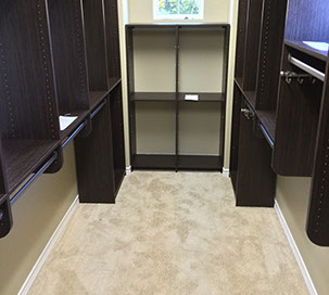 Custom Paint Grade Wainscoting and Crown Molding with a Swiss Coffee Lacquer Finish.