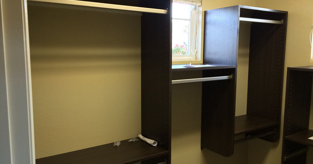 Custom Paint Grade Wainscoting and Crown Molding with a Swiss Coffee Lacquer Finish.