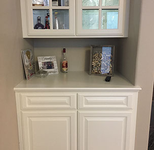 Traditional Paint Grade Entertainment Center with an Antique White Lacquer Finish