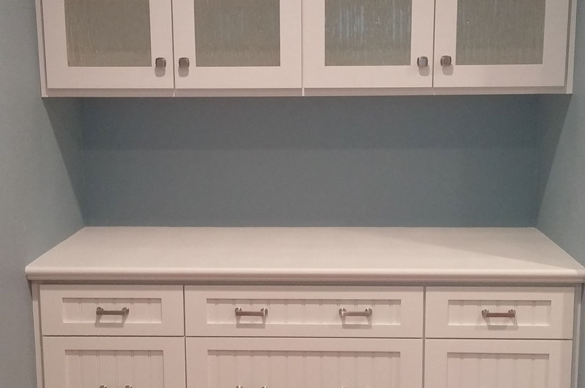 Traditional Paint Grade Entertainment Center with an Antique White Lacquer Finish