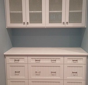 Traditional Paint Grade Entertainment Center with an Antique White Lacquer Finish