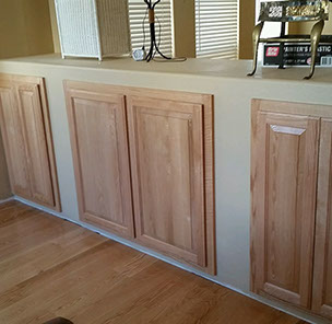 Traditional Paint Grade Entertainment Center with an Antique White Lacquer Finish