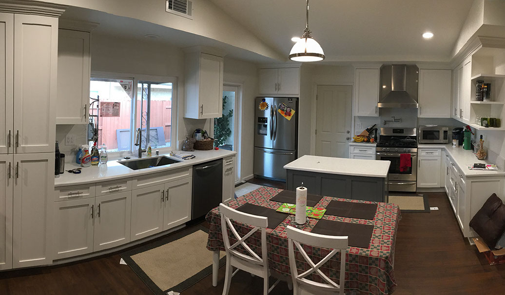Frameless Alder Kitchen with Shaker Style doors with a Merlot Lacquer Finish