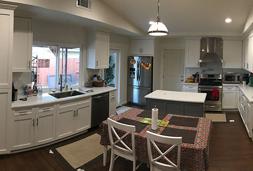 Frameless Alder Kitchen with Shaker Style doors with a Merlot Lacquer Finish