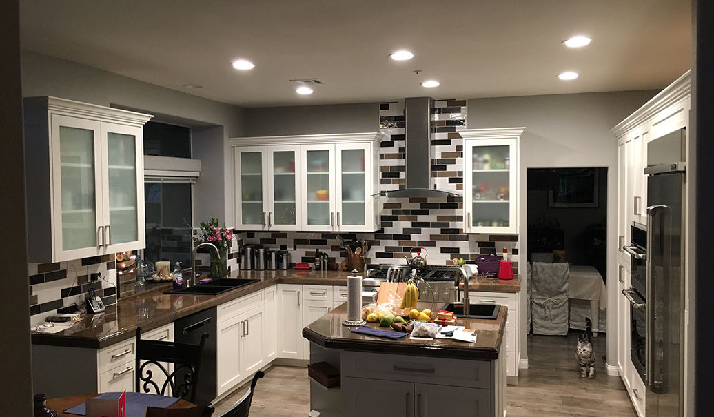 Frameless Alder Kitchen with Shaker Style doors with a Merlot Lacquer Finish