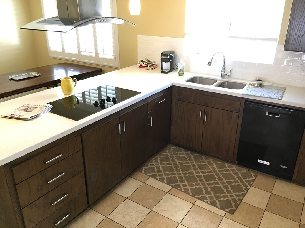 Frameless Alder Kitchen with Shaker Style doors with a Merlot Lacquer Finish