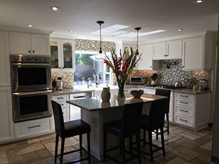 Frameless Alder Kitchen with Shaker Style doors with a Merlot Lacquer Finish