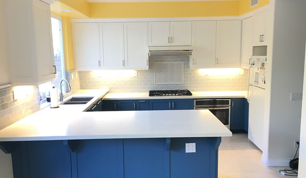 Frameless Alder Kitchen with Shaker Style doors with a Merlot Lacquer Finish