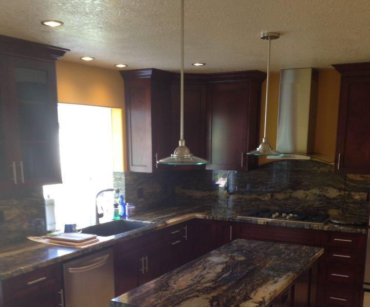 Frameless Alder Kitchen with Shaker Style doors with a Merlot Lacquer Finish