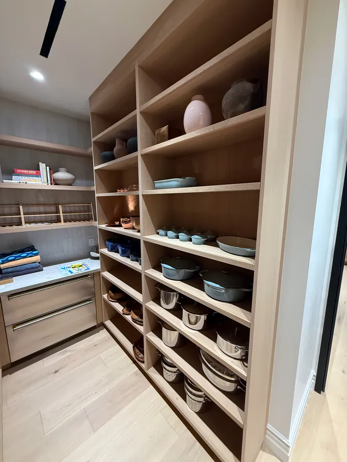 Walk-in pantry with tall open wood shelves, Thousand Oaks