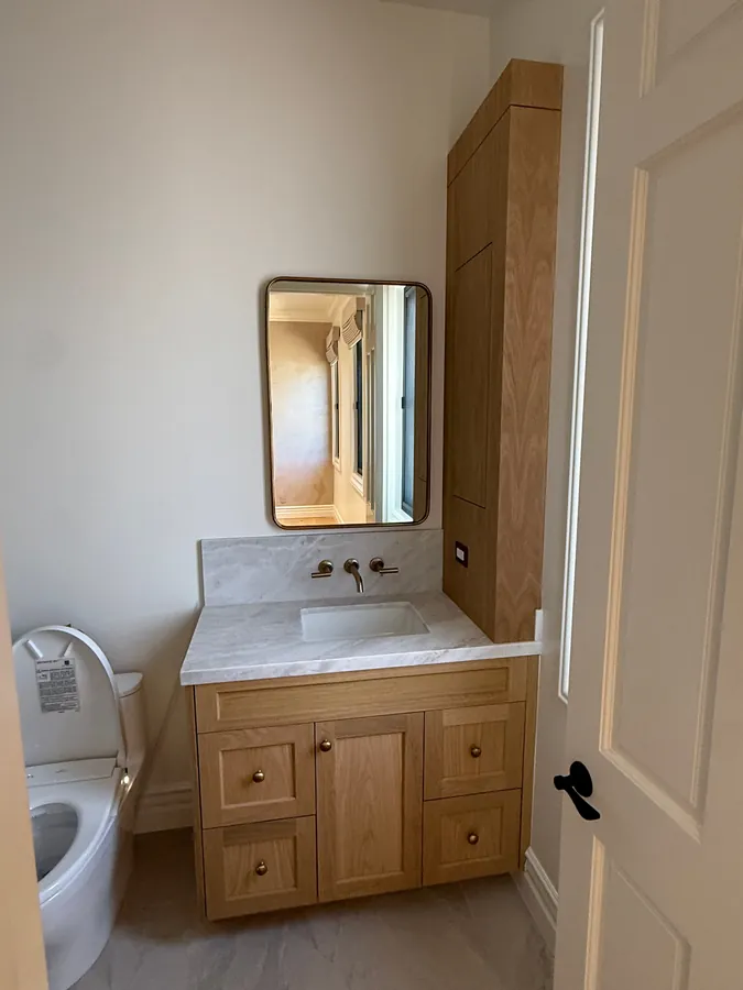 Oak shaker vanity with a tall linen cabinet and a stone top, Thousand Oaks
